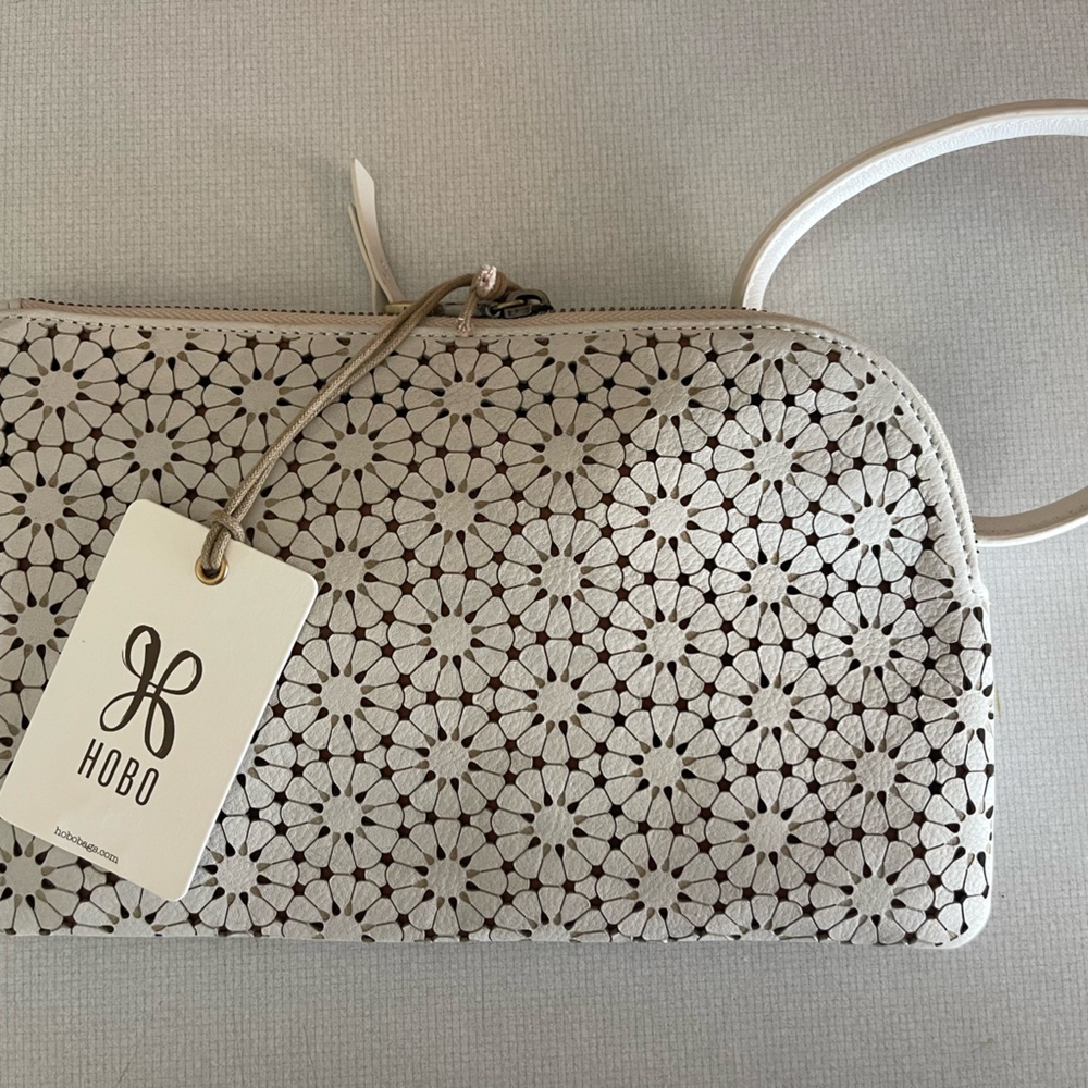 HOBO Silver Floral Laser-Cut Wristlet